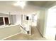Bright hallway with carpet and white bannister overlooking the front entryway at 110 Bristolwood Cir, Morrisville, NC 27560