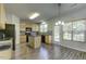 Well-lit kitchen featuring an island, modern appliances, and ample cabinet space at 110 Bristolwood Cir, Morrisville, NC 27560