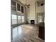 Bright living room boasting a fireplace, large windows, and hardwood floors at 110 Bristolwood Cir, Morrisville, NC 27560