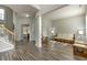 Open-concept living area featuring hardwood floors and lots of natural light at 110 Bristolwood Cir, Morrisville, NC 27560