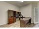 Functional office space featuring built in cabinets and a computer desk at 110 Bristolwood Cir, Morrisville, NC 27560