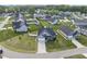 Beautifully landscaped home with an inviting front lawn, driveway and backyard in a quiet, well-manicured neighborhood at 110 Deacon Ridge Ln, Youngsville, NC 27596