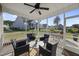 Comfortable screened porch features wicker furniture and a view of the backyard at 110 Deacon Ridge Ln, Youngsville, NC 27596