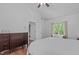 Charming bedroom featuring hardwood flooring, neutral colors, and generous natural light at 110 Ferris Wheel Ct, Cary, NC 27513