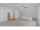 Light and airy bedroom offers carpet, a ceiling fan, and light blue walls at 110 Ferris Wheel Ct, Cary, NC 27513