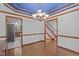 Spacious dining room showcases elegant design with hardwood floors and views of the kitchen and hallway at 110 Ferris Wheel Ct, Cary, NC 27513