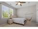 Bedroom with natural light and suspended chair at 112 Glenspring Way, Morrisville, NC 27560