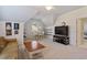 Spacious room features great natural light and room for couches and a dining set at 112 Glenspring Way, Morrisville, NC 27560