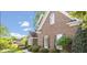 Charming brick home with manicured landscaping and a well-maintained lawn at 112 Glenspring Way, Morrisville, NC 27560