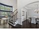 Open-concept with staircase and chandelier at 112 Glenspring Way, Morrisville, NC 27560
