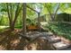 Beautiful wooden swing in wooded, shady area. Perfect spot to sit and relax! at 112 Glenspring Way, Morrisville, NC 27560