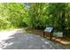 Scenic walking trail surrounded by lush greenery and natural beauty at 112 Glenspring Way, Morrisville, NC 27560
