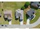 Aerial perspective of home displaying roof, lawn, landscaping, and driveway in a suburban neighborhood at 116 Colonade Ct, Benson, NC 27504