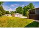 Two-car garage and screened in porch in a large backyard at 117 Castlerock Dr, Durham, NC 27713