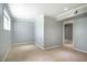Neutral-toned room with tile flooring, bright lighting and a large window at 117 Castlerock Dr, Durham, NC 27713