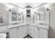 Elegant bathroom featuring a dual-sink vanity with marble countertops and ample storage at 117 Queensferry Rd, Cary, NC 27511
