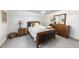 Comfortable bedroom with stylish decor, soft carpet, and bright overhead lighting at 117 Queensferry Rd, Cary, NC 27511