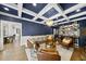 Well-appointed living room with a full bar, stylish seating, and an open layout at 117 Queensferry Rd, Cary, NC 27511