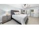 Spacious main bedroom with a ceiling fan, ensuite bathroom, and neutral decor at 117 Queensferry Rd, Cary, NC 27511