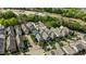 An aerial view of neighborhood homes featuring varying colors, landscaping, and driveways at 1209 Harp St, Raleigh, NC 27604