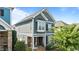Lovely two-story home featuring a covered front porch and inviting curb appeal at 1209 Harp St, Raleigh, NC 27604
