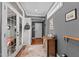 Inviting hallway featuring neutral colors and wood floors at 1209 Harp St, Raleigh, NC 27604