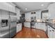 Spacious kitchen with stainless steel appliances and ample countertop space at 1209 Harp St, Raleigh, NC 27604