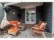 Relaxing outdoor patio area furnished with comfortable seating, great for entertaining at 1209 Harp St, Raleigh, NC 27604