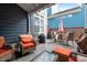 Outdoor patio featuring comfortable seating and a view of the backyard, perfect for relaxing at 1209 Harp St, Raleigh, NC 27604