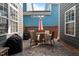 Outdoor patio features a table with chairs, ideal for entertaining guests at 1209 Harp St, Raleigh, NC 27604