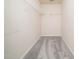 Walk-in closet equipped with wire shelving, ready for optimal organization at 1218 S Franklin St, Wake Forest, NC 27587