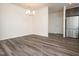 Dining room features modern chandelier and stainless steel refrigerator at 1218 S Franklin St, Wake Forest, NC 27587