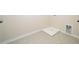 Tiled laundry area with washing machine hookups and a neutral color scheme at 1218 S Franklin St, Wake Forest, NC 27587
