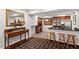 The finished basement features a bar area with granite counters at 12527 Bellstone Ln, Raleigh, NC 27614
