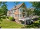 Spacious home with large deck and well-maintained yard, perfect for outdoor living at 12527 Bellstone Ln, Raleigh, NC 27614