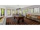 Spacious game room features ample natural light, window and pool table at 12527 Bellstone Ln, Raleigh, NC 27614