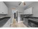 Functional laundry area features plenty of cabinet space, with modern appliances at 12537 Birchfalls Dr, Raleigh, NC 27614