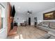 Spacious living room with a fireplace and lots of natural light at 12537 Birchfalls Dr, Raleigh, NC 27614