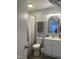 Bathroom with white shower curtain, mirror and vanity with sink and toilet at 130 S Estes Dr # C-5, Chapel Hill, NC 27514