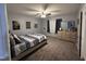 Bedroom with a bed, dresser, ceiling fan, window, curtains and posters on the wall at 130 S Estes Dr # C-5, Chapel Hill, NC 27514