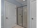 Bathroom with tile shower featuring glass door at 1501 Samuel Wait Ln, Wake Forest, NC 27587