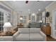 Open-concept living room and kitchen with plenty of natural light and hardwood floors at 1501 Samuel Wait Ln, Wake Forest, NC 27587