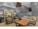 Comfortable bonus room features ample seating and neutral colors at 1501 Samuel Wait Ln, Wake Forest, NC 27587