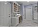 Functional office space with built-in shelving, a cozy desk area, and lots of natural light at 1501 Samuel Wait Ln, Wake Forest, NC 27587