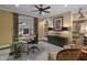 Stylish home office featuring custom built-ins, a modern desk, and a comfortable seating area at 1501 Samuel Wait Ln, Wake Forest, NC 27587