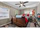 Comfortable bedroom featuring wood floors and ample natural light at 1612 Regency Dr, Burlington, NC 27215