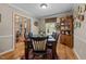 Charming dining room featuring hardwood floors, traditional furnishings, and lots of decor at 1612 Regency Dr, Burlington, NC 27215