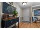 Welcoming entryway with decorative accents, wood flooring, and neutral wall colors at 1612 Regency Dr, Burlington, NC 27215