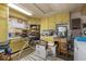 Spacious laundry room equipped with ample storage and laundry appliances at 1612 Regency Dr, Burlington, NC 27215