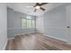 Bedroom with hardwood floors and a window, perfect for relaxation and natural light at 170 Homestead Rd, Angier, NC 27501